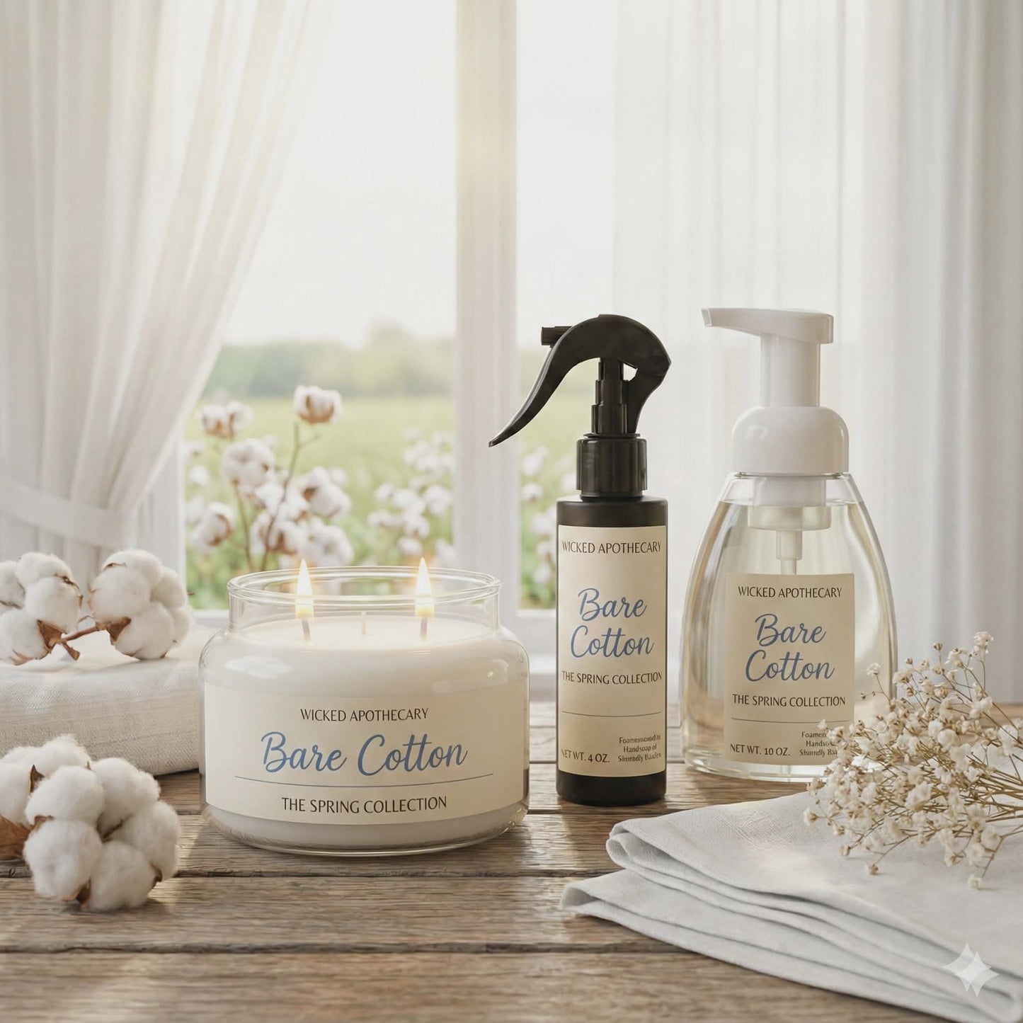 Bare Cotton candle, spray, and soap on a wooden surface with a window in the background