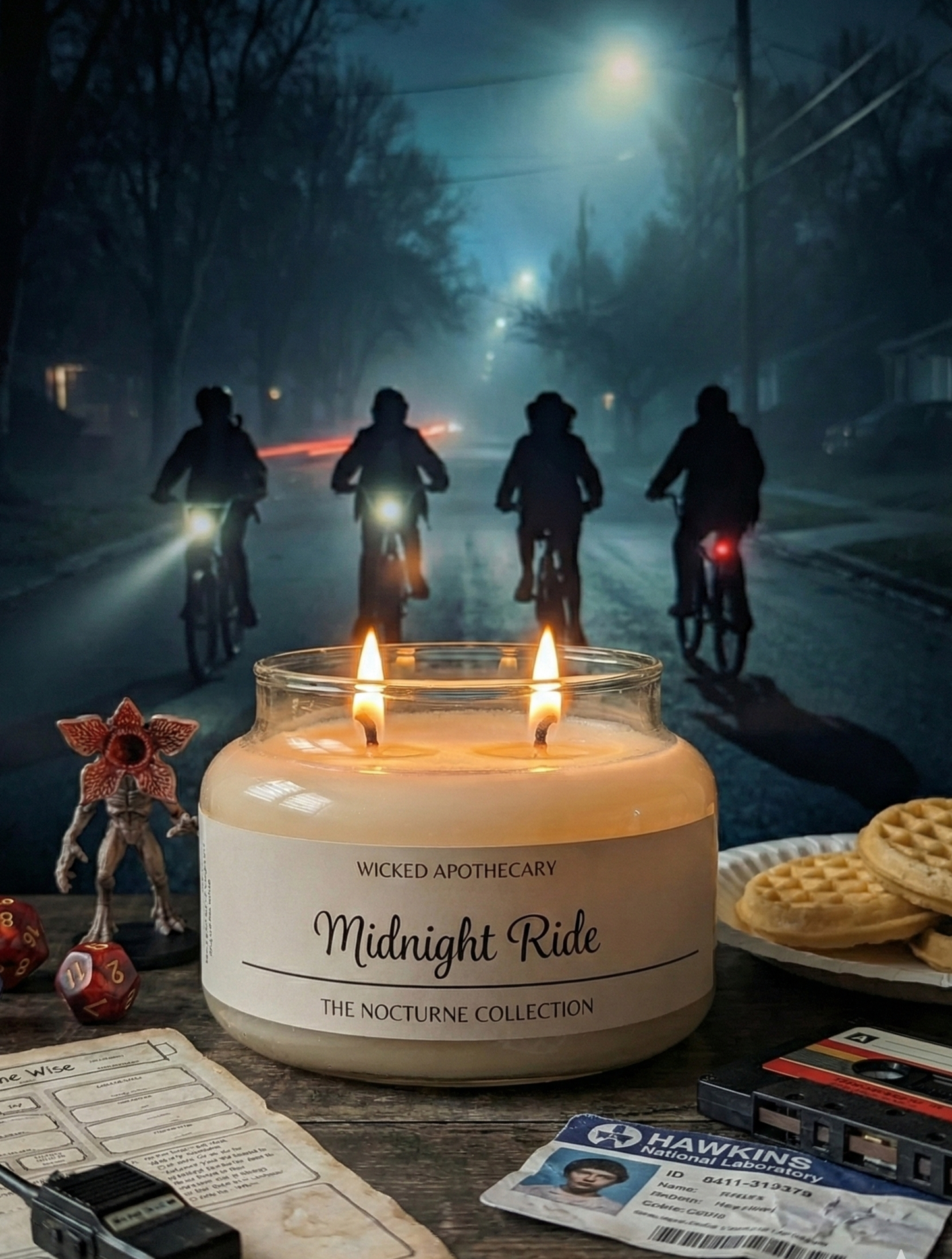 Candle labeled 'Midnight Ride' with a dark street scene and silhouettes of people on bikes in the background.