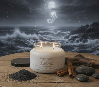 Candle labeled 'Siren's Call' on a wooden surface with a mystical background of waves and moon.