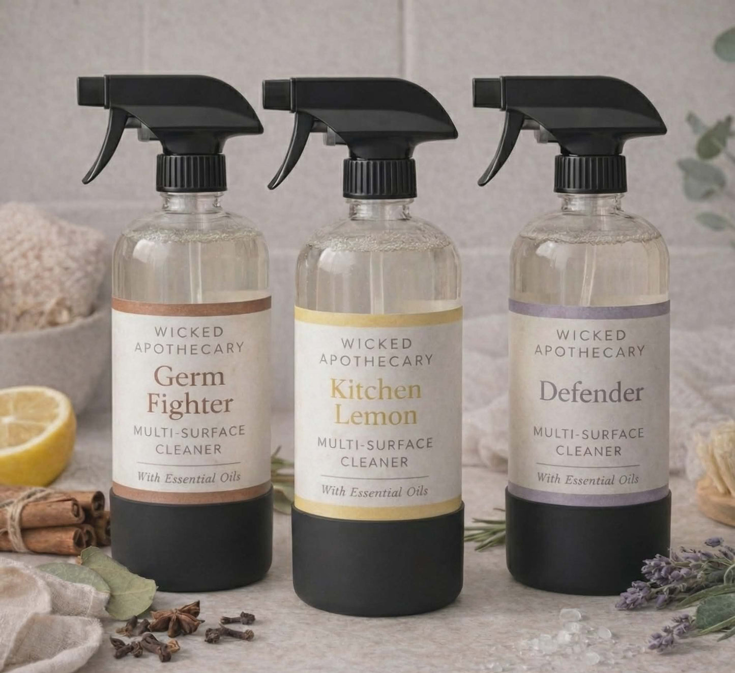 Three bottles of Wicked Apothecary multi-surface cleaners on a neutral background.
