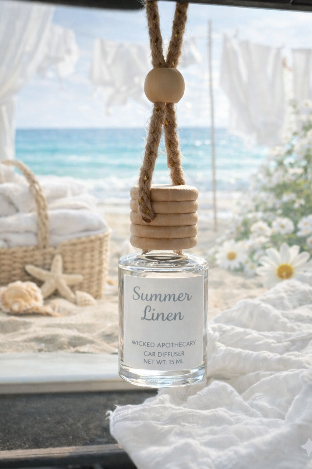 Car diffuser labeled 'Summer Linen' with a beach view in the background