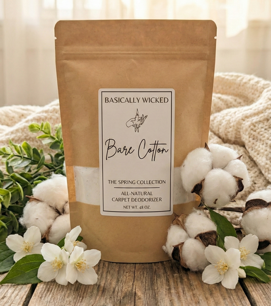 Bare Cotton carpet deodorizer package with cotton flowers and leaves on a wooden surface