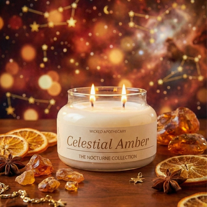 Candle labeled 'Celestial Amber' from Wicked Apothecary on a wooden surface with decorative elements.